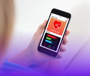 Smartphone showing heart rate on a mhealth app