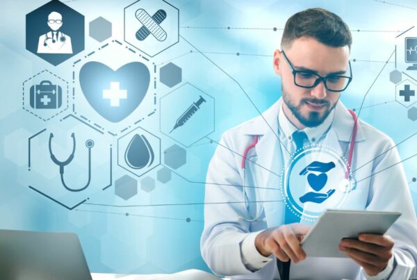 doctor holding a tablet and health icons