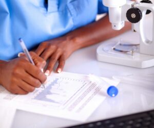Woman writing a scientific report